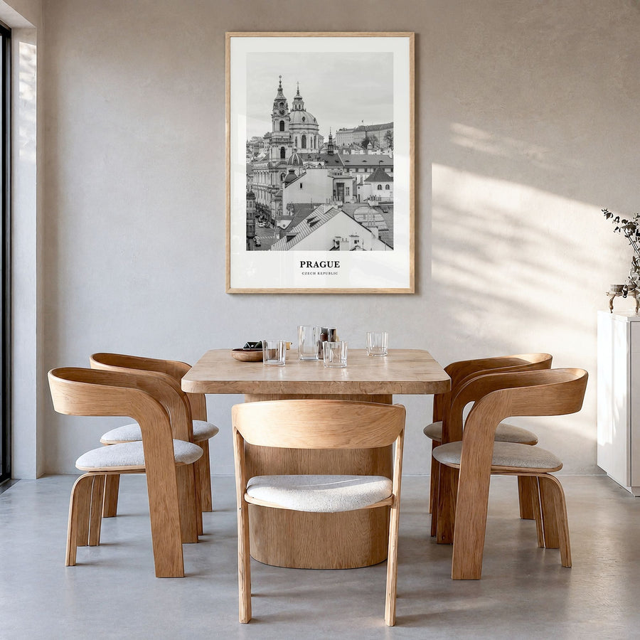 Prague Classic No 1 Poster in a natural wood frame, hanging in a dining room
