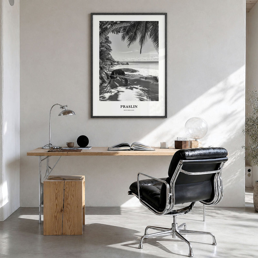 Praslin Classic Poster in a black wood frame, hanging in a bright home office