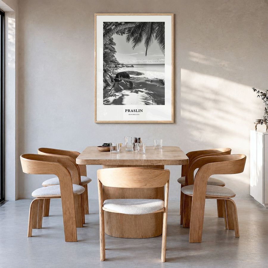 Praslin Classic Poster in a natural wood frame, hanging in a dining room