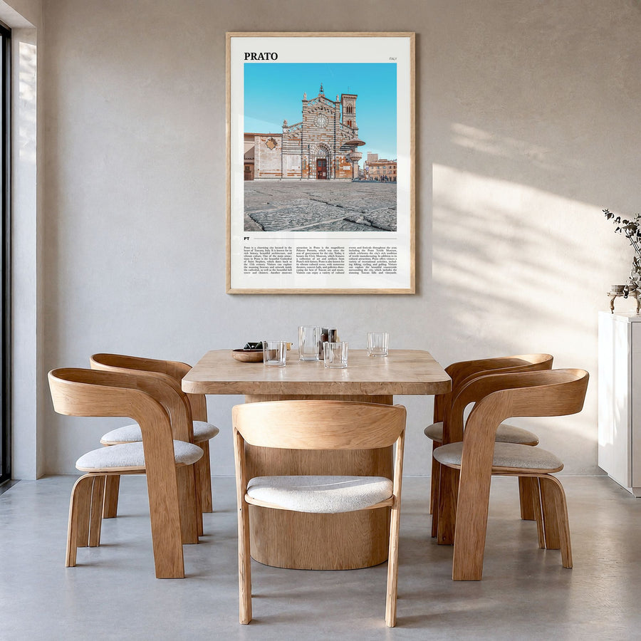 Prato Travel Poster in a natural wood frame, hanging in a dining room