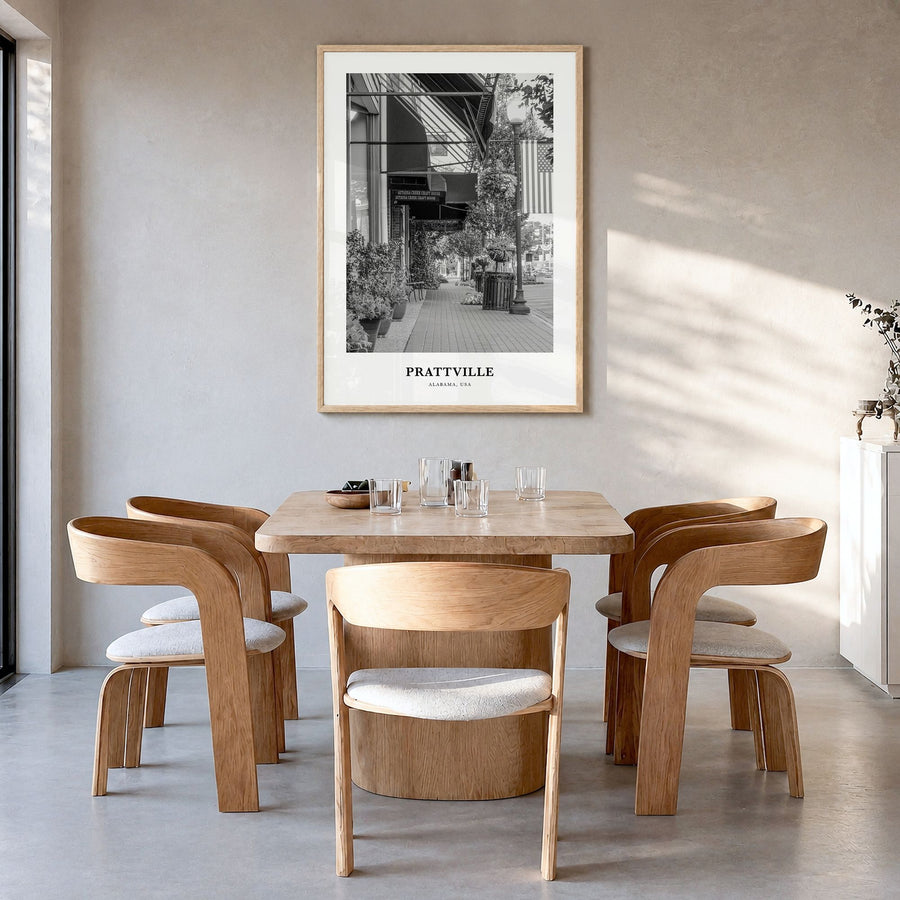 Prattville Classic Poster in a natural wood frame, hanging in a dining room