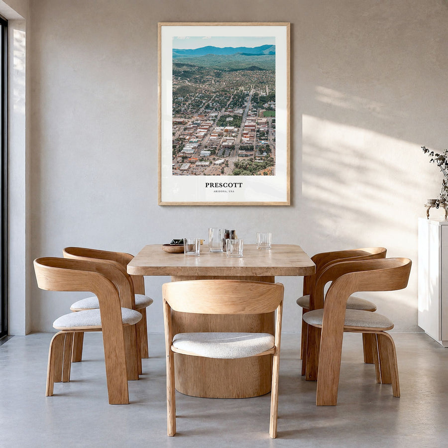 Prescott Classic Poster in a natural wood frame, hanging in a dining room