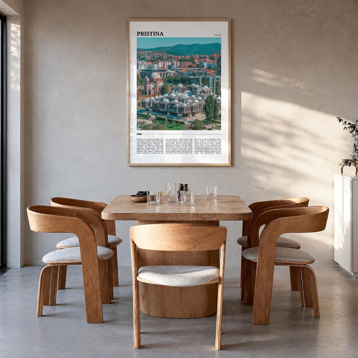 Pristina colorful travel poster of Kosovo – vertical wall art in natural wood frame, hanging on wall