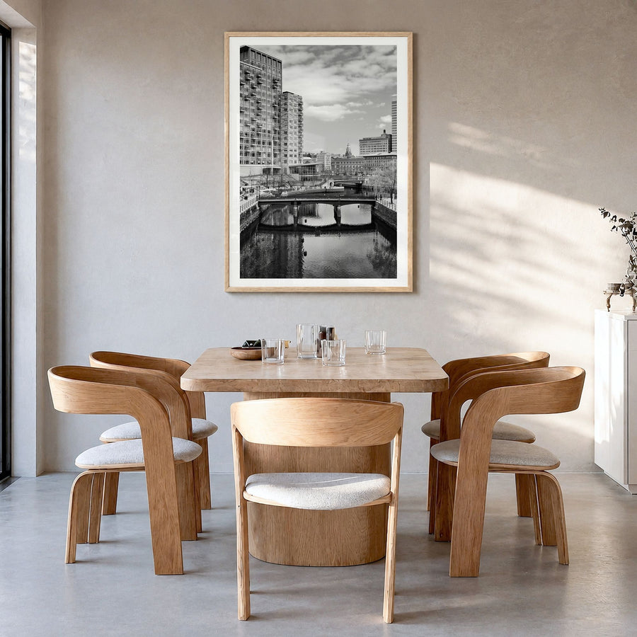 Providence Photo Poster in a natural wood frame, hanging in a dining room, white border