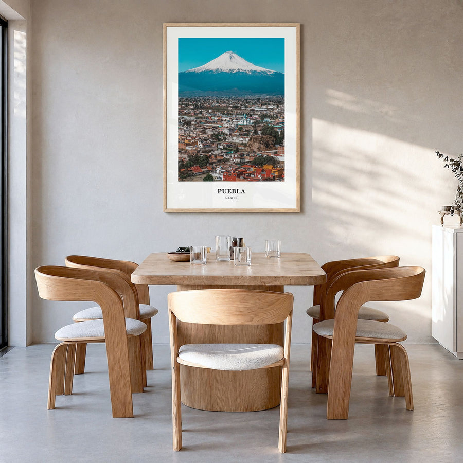 Puebla Classic Poster in a natural wood frame, hanging in a dining room