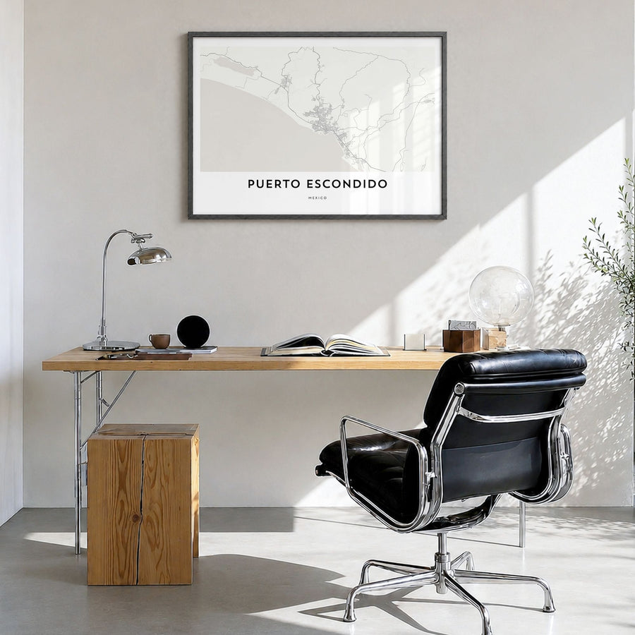 Puerto Escondido Map Poster in a black wood frame, hanging in a bright home office
