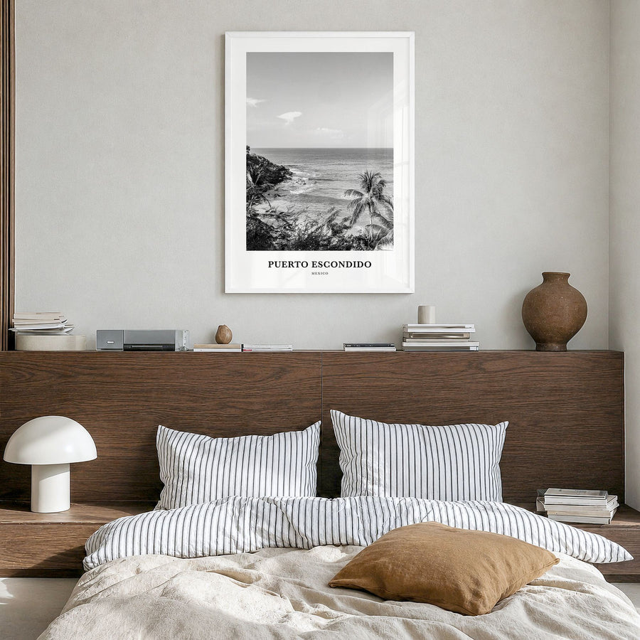 Puerto Escondido Classic Poster in a white wood frame, hanging in a bedroom