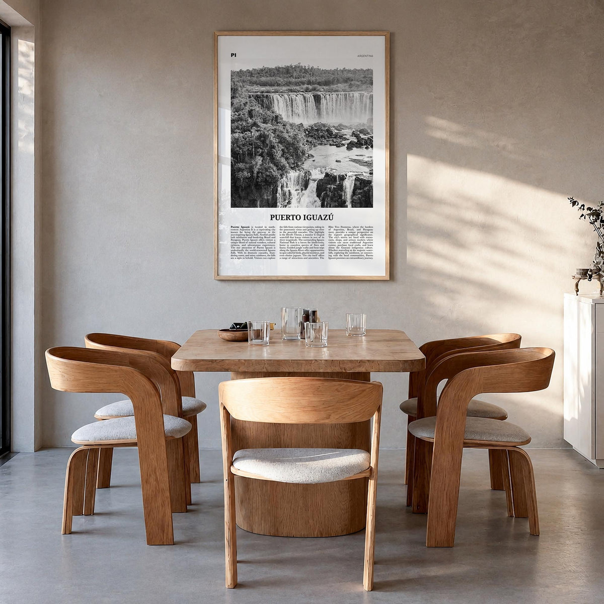 Puerto Iguazú black & white newspaper poster of Argentina – vertical wall art in natural wood frame, hanging on wall