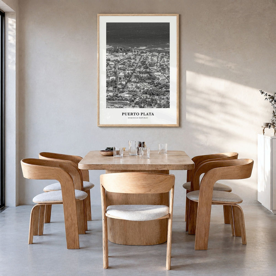 Puerto Plata Classic Poster in a natural wood frame, hanging in a dining room