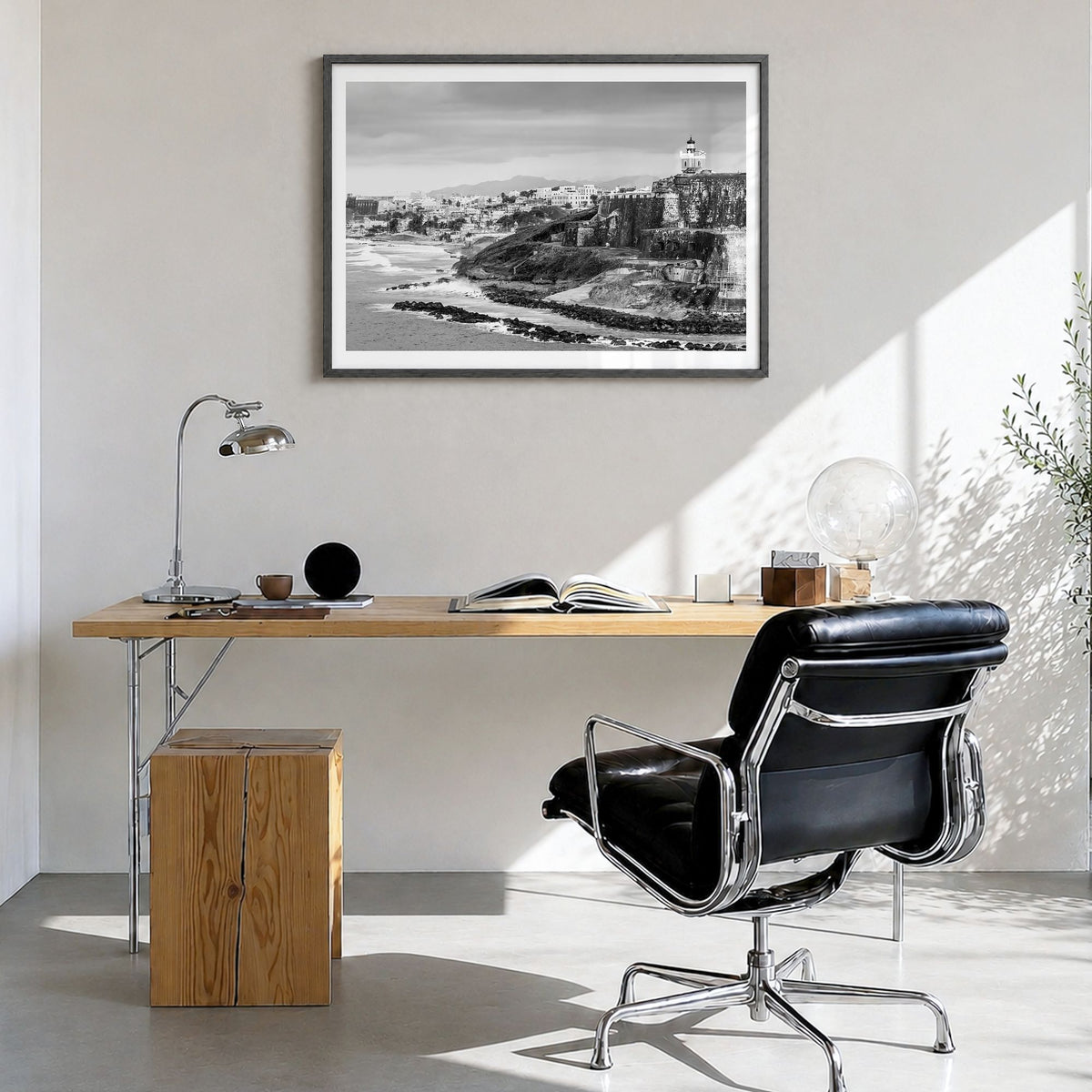 Puerto Rico Photo Poster in a black wood frame, hanging in a bright home office, white border