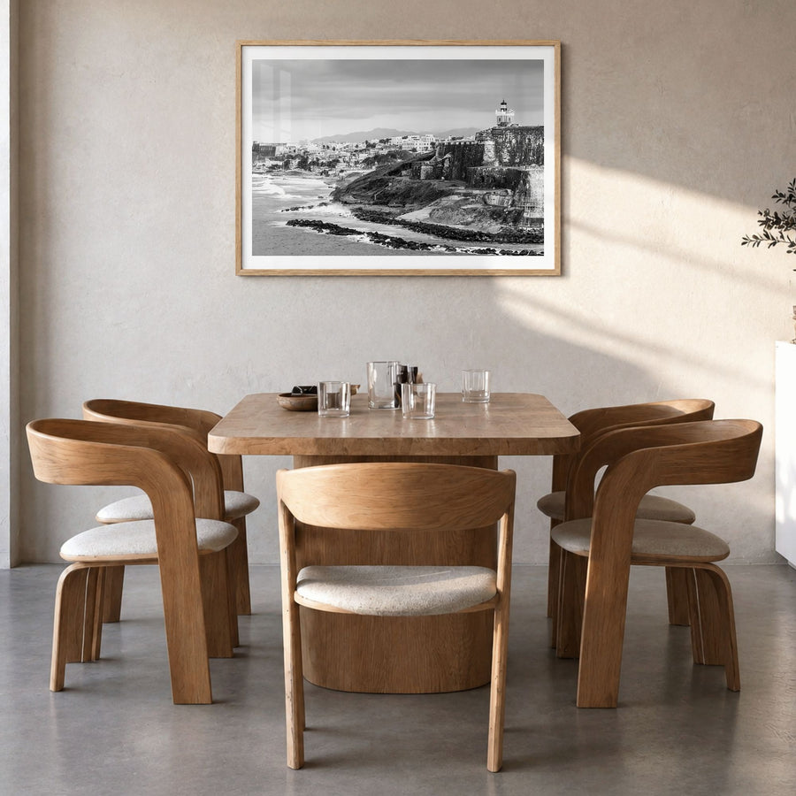 Puerto Rico Photo Poster in a natural wood frame, hanging in a dining room, white border