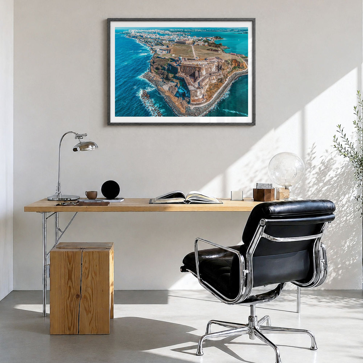 Puerto Rico Photo Poster in a black wood frame, hanging in a bright home office, white border