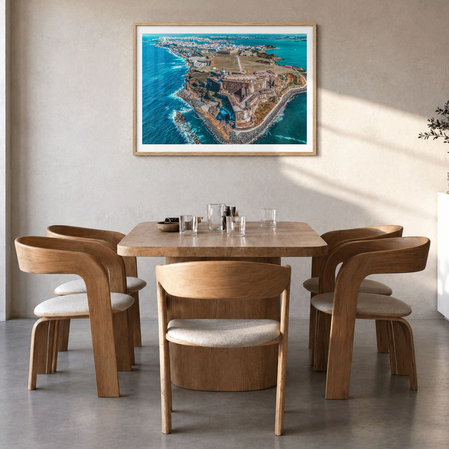 Puerto Rico Photo Poster in a natural wood frame, hanging in a dining room, white border