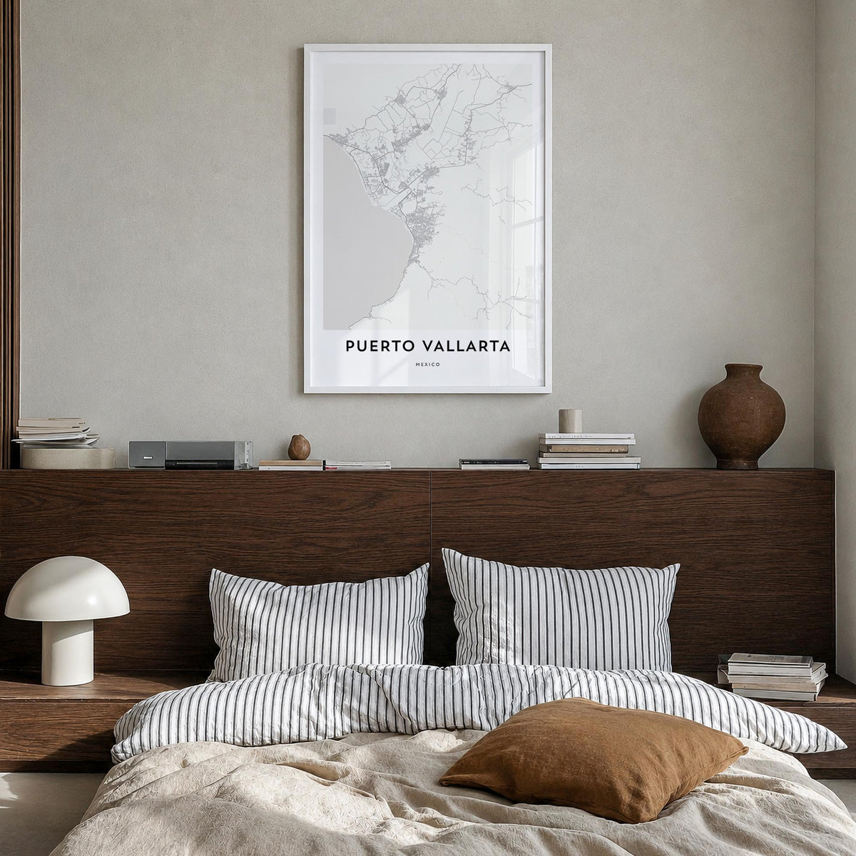 Puerto Vallarta black & white map poster of Mexico – vertical wall art in white wood frame, hanging on wall