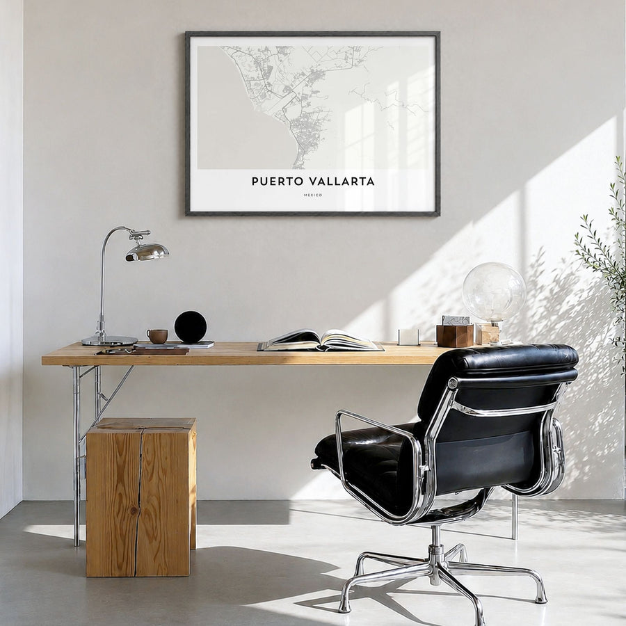 Puerto Vallarta Map Poster in a black wood frame, hanging in a bright home office