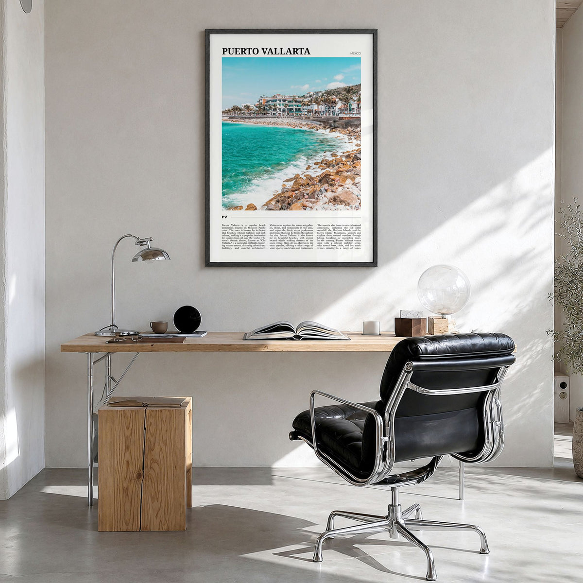 Puerto Vallarta Travel Poster in a black wood frame, hanging in a bright home office