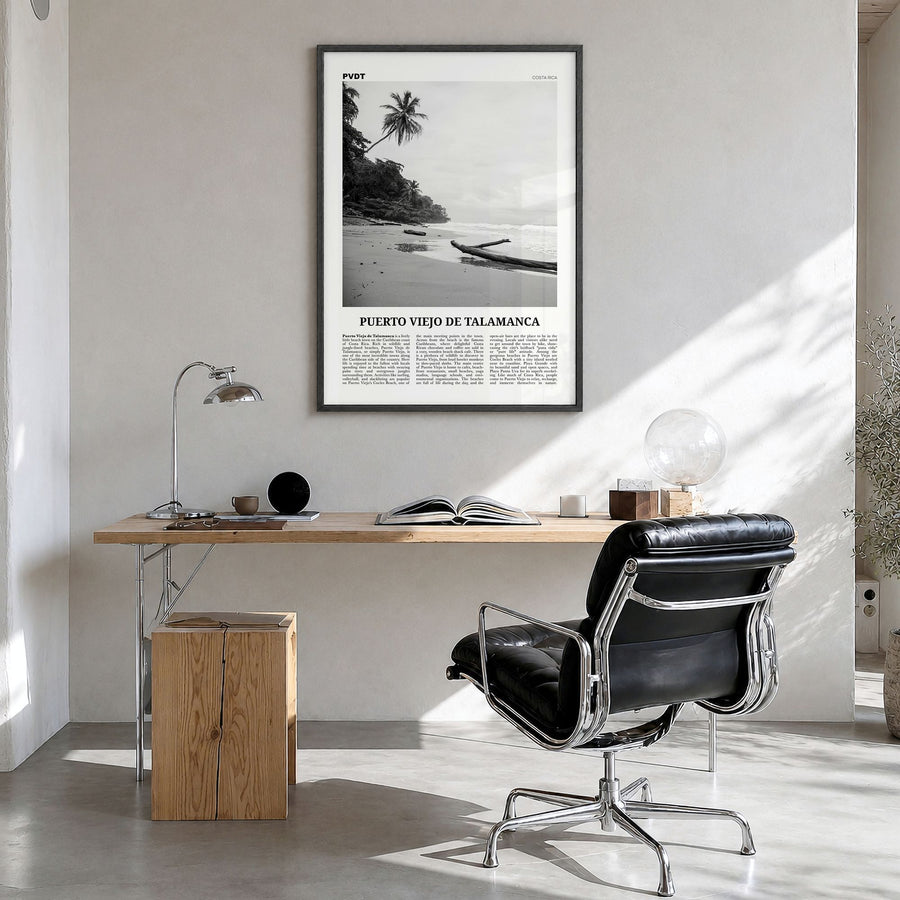Puerto Viejo de Talamanca Newspaper Poster in a black wood frame, hanging in a bright home office