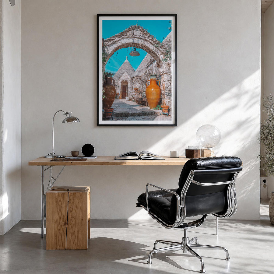 Puglia no. 2 colorful photo poster of Italy – vertical wall art in black wood frame with white border, hanging on wall