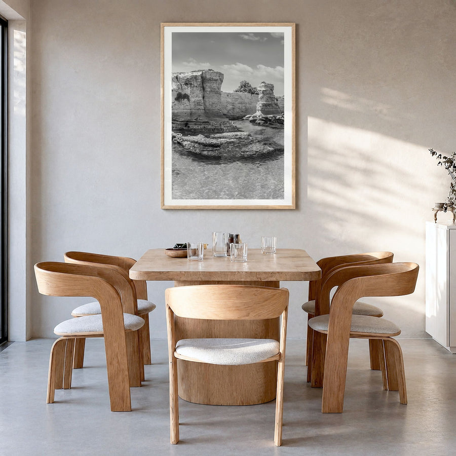 Apulia Photo Poster in a natural wood frame, hanging in a dining room, white border