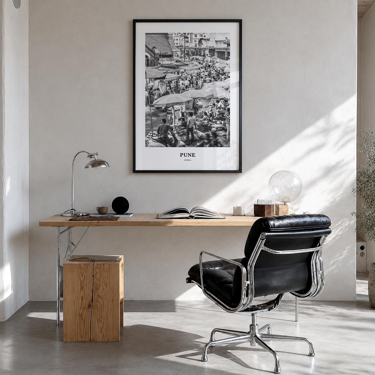 Pune black & white classic poster of India – vertical wall art in black wood frame, hanging on wall