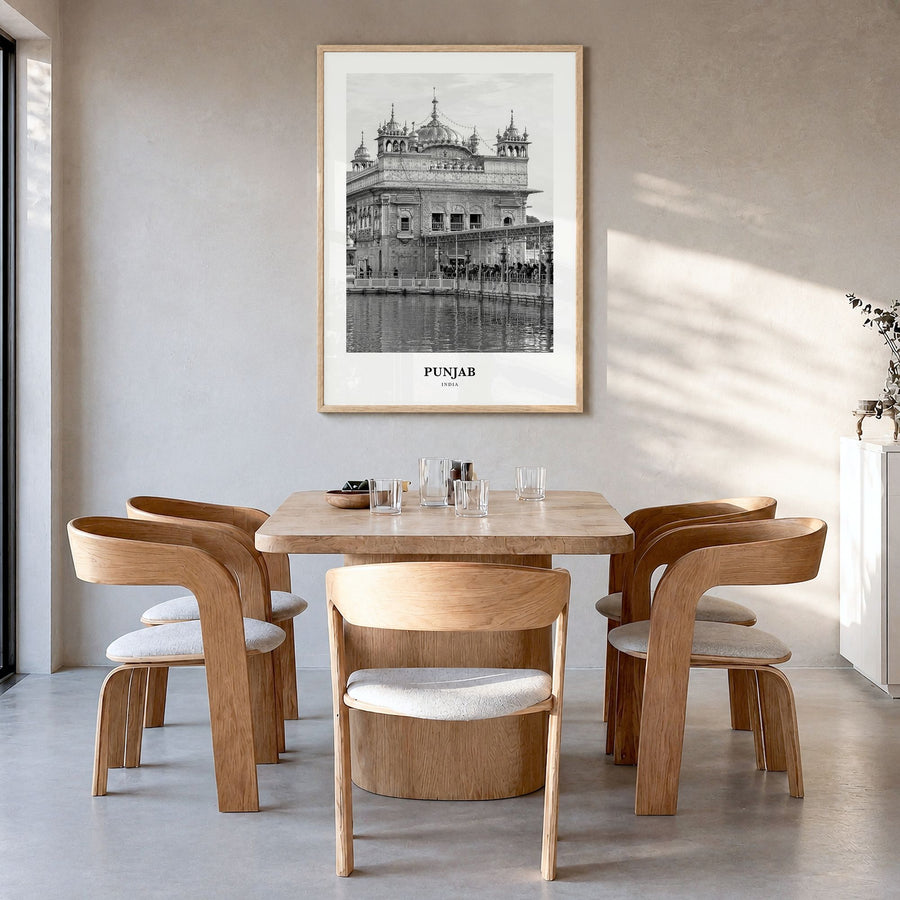 Punjab Classic Poster in a natural wood frame, hanging in a dining room