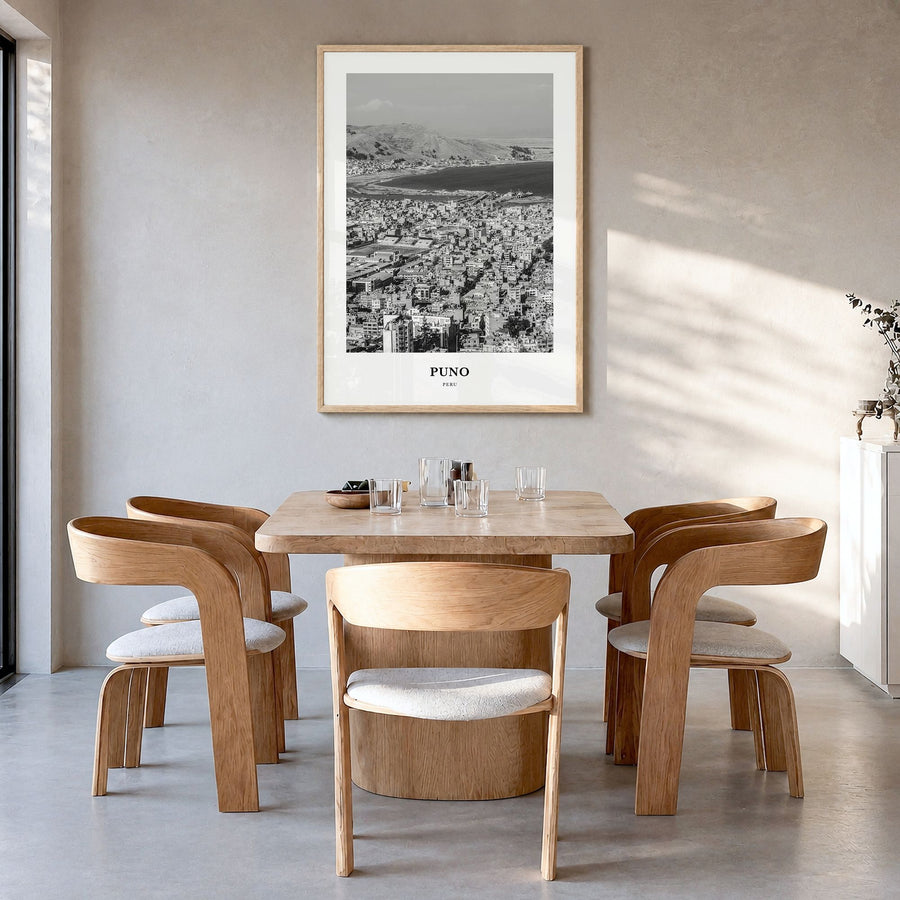 Puno Classic Poster in a natural wood frame, hanging in a dining room