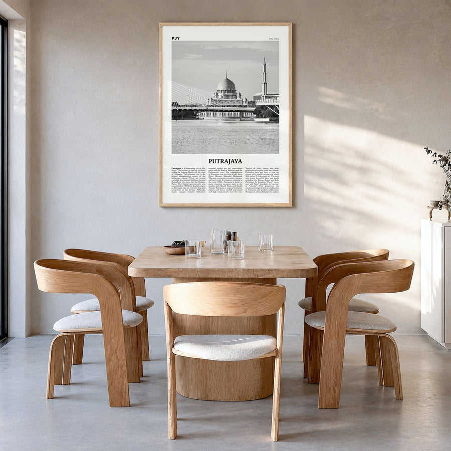 Putrajaya Newspaper Poster in a natural wood frame, hanging in a dining room