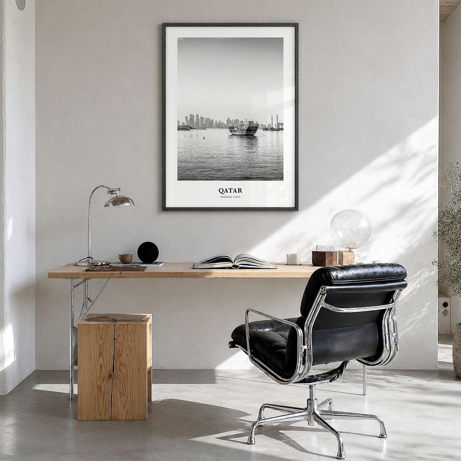 Qatar Classic Poster in a black wood frame, hanging in a bright home office