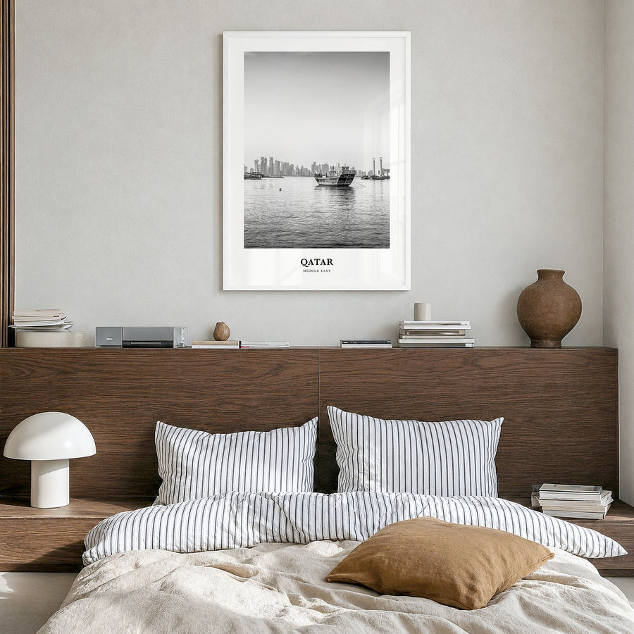 Qatar Classic Poster in a white wood frame, hanging in a bedroom