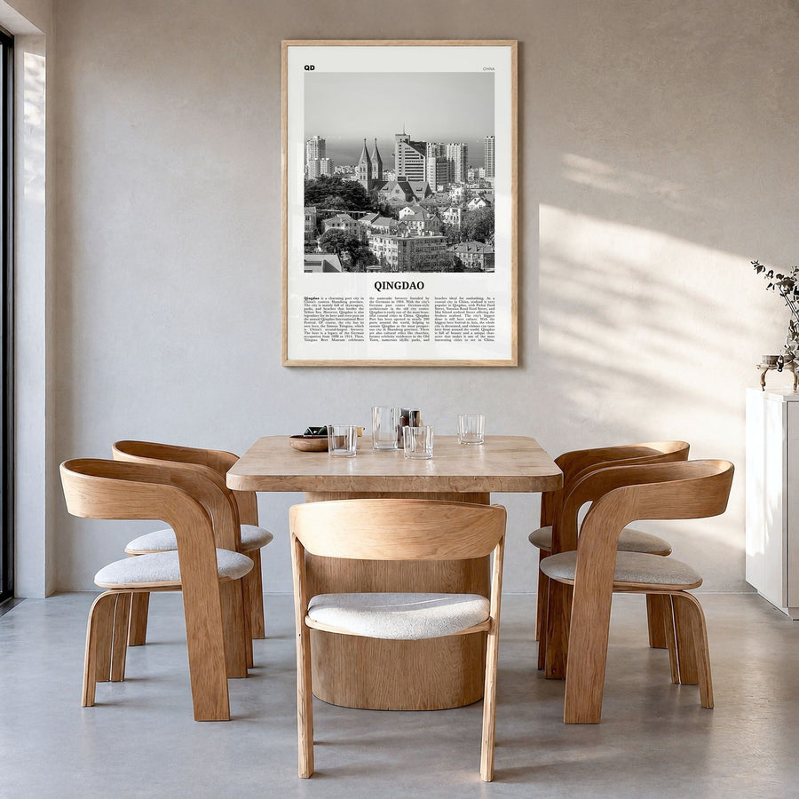 Qingdao Newspaper Poster in a natural wood frame, hanging in a dining room