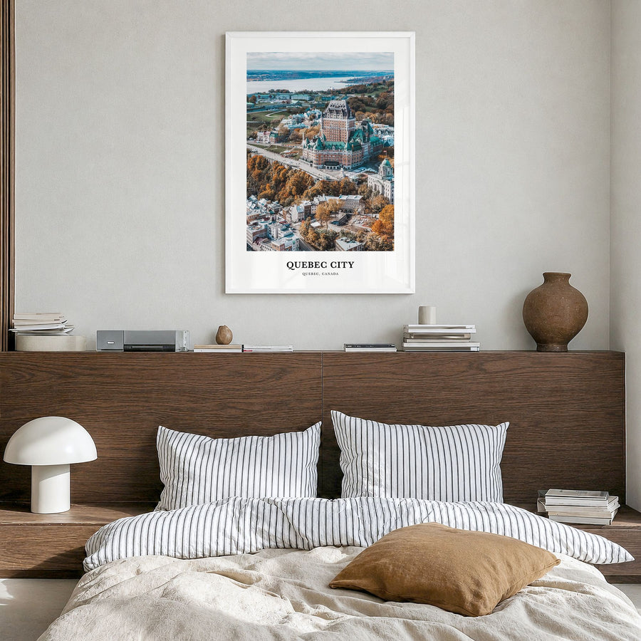 Quebec City Classic Poster in a white wood frame, hanging in a bedroom