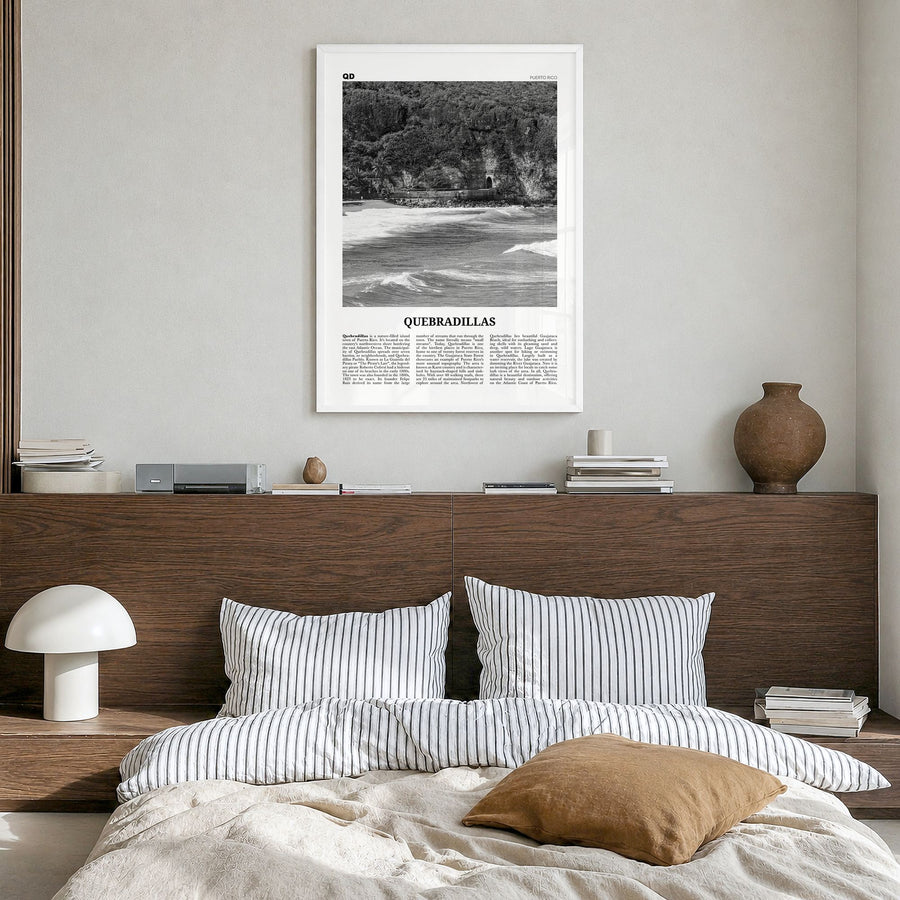 Quebradillas Newspaper Poster in a white wood frame, hanging in a bedroom