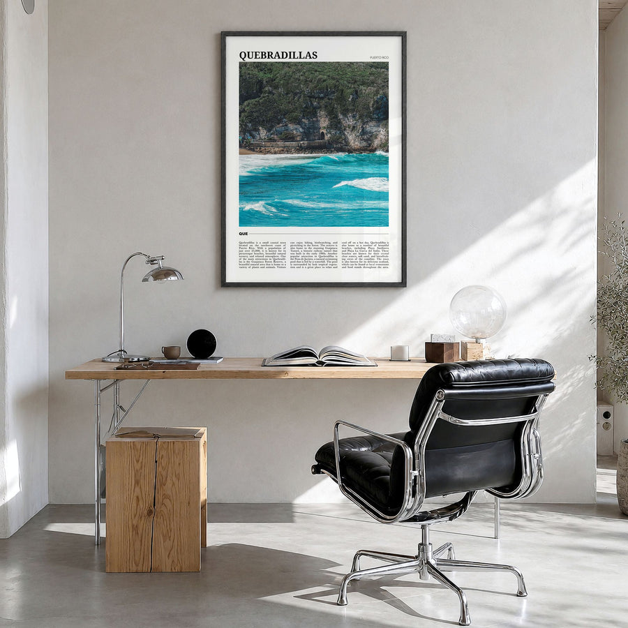 Quebradillas Travel Poster in a black wood frame, hanging in a bright home office