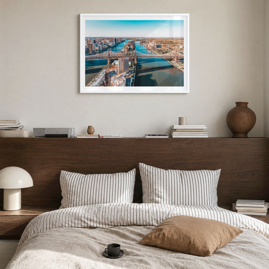Queens, New York Photo Poster in a white wood frame, hanging in a bedroom, white border