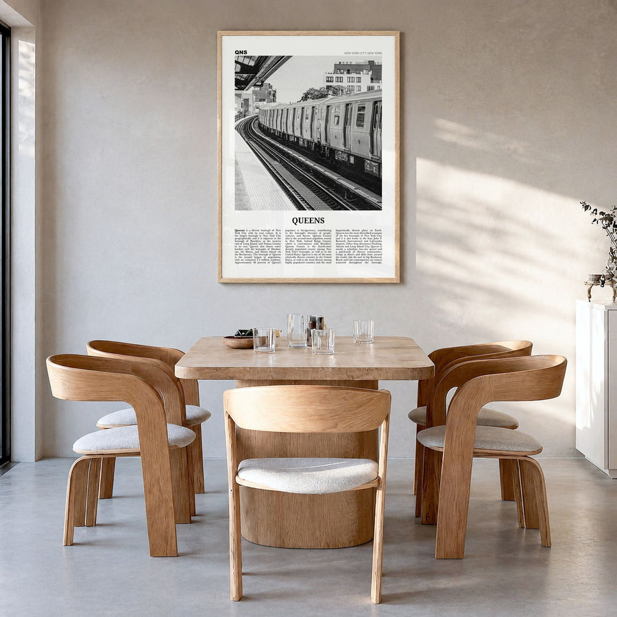 Queens, New York Newspaper No 3 Poster in a natural wood frame, hanging in a dining room