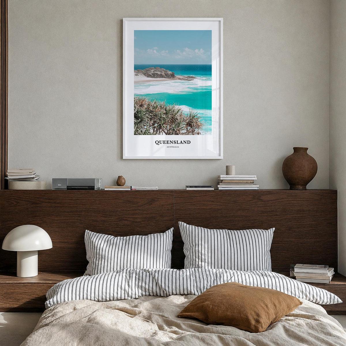 Queensland colorful classic poster of Australia – vertical wall art in white wood frame, hanging on wall