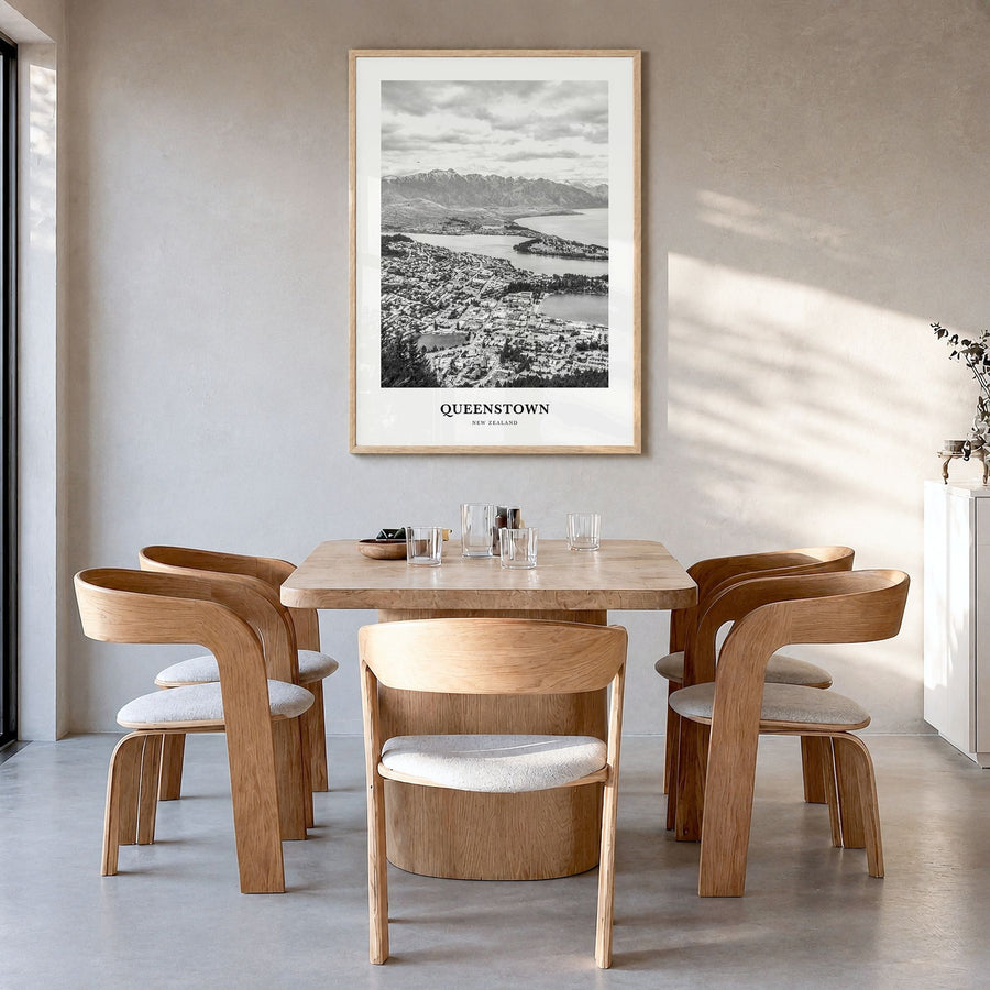 Queenstown Classic Poster in a natural wood frame, hanging in a dining room
