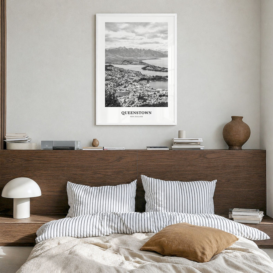 Queenstown Classic Poster in a white wood frame, hanging in a bedroom