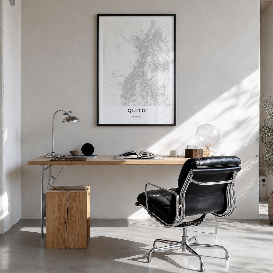Quito black & white map poster of Ecuador – vertical wall art in black wood frame, hanging on wall