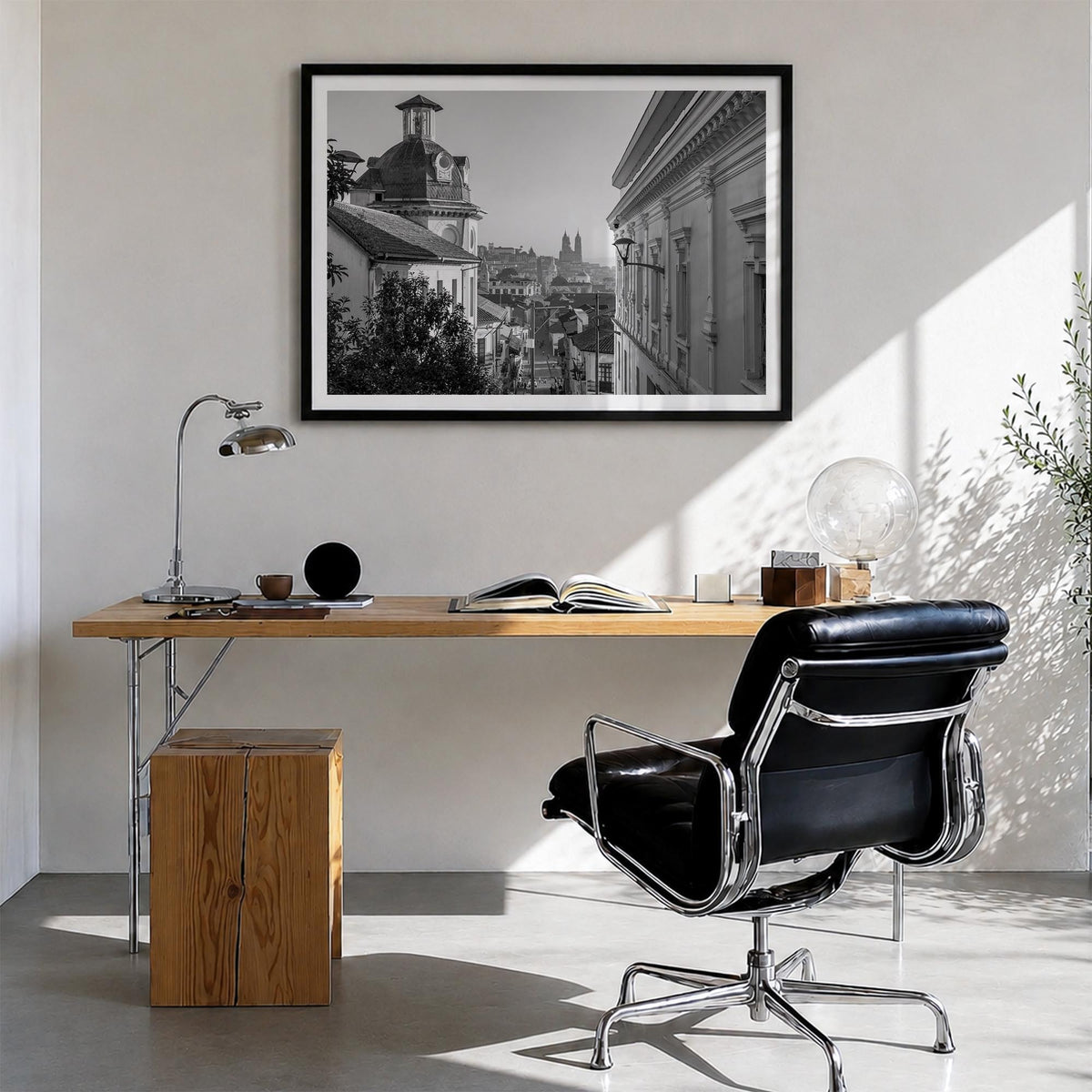 Quito black & white photo poster of Ecuador – horizontal wall art in black wood frame with white border, hanging on wall