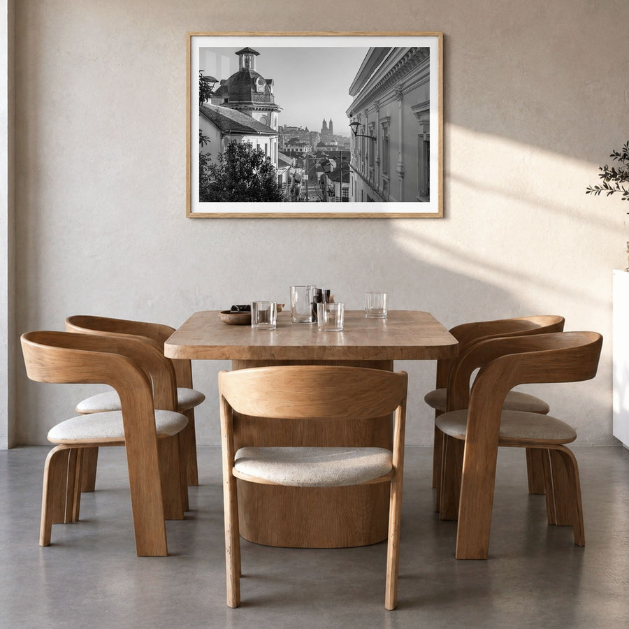 Quito Photo Poster in a natural wood frame, hanging in a dining room, white border