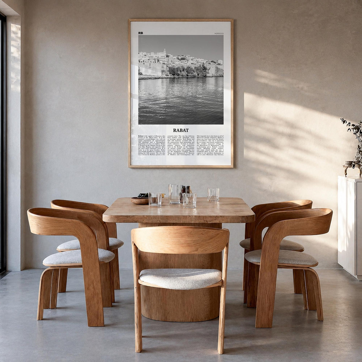Rabat black & white newspaper poster of Morocco – vertical wall art in natural wood frame, hanging on wall
