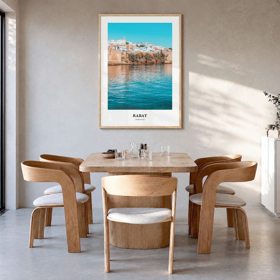 Rabat Classic Poster in a natural wood frame, hanging in a dining room