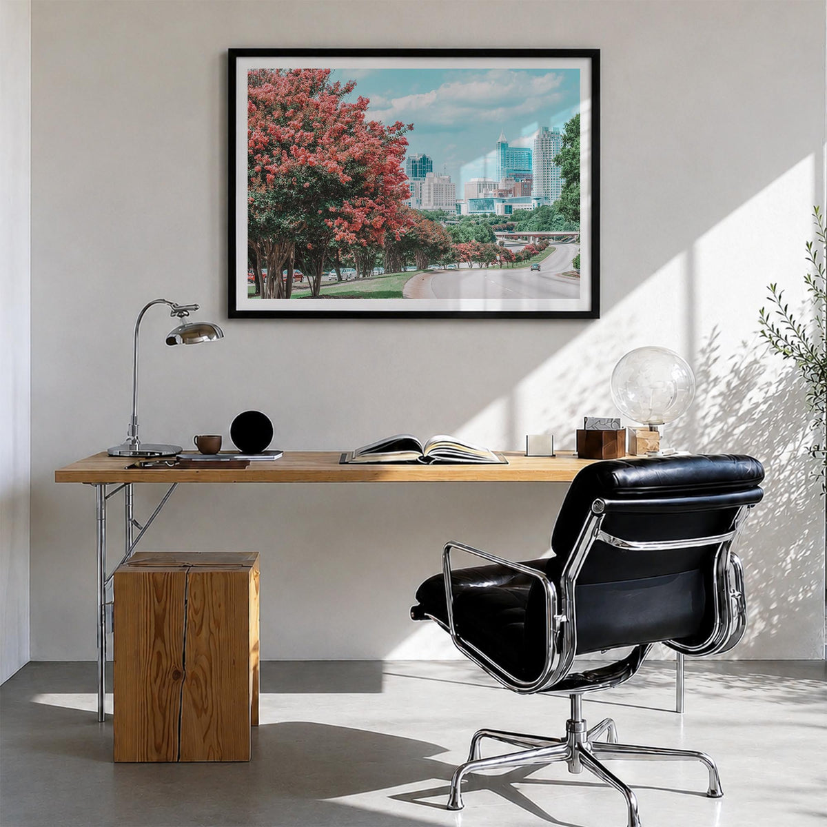 Raleigh colorful photo poster of North Carolina, USA – horizontal wall art in black wood frame with white border, hanging on 