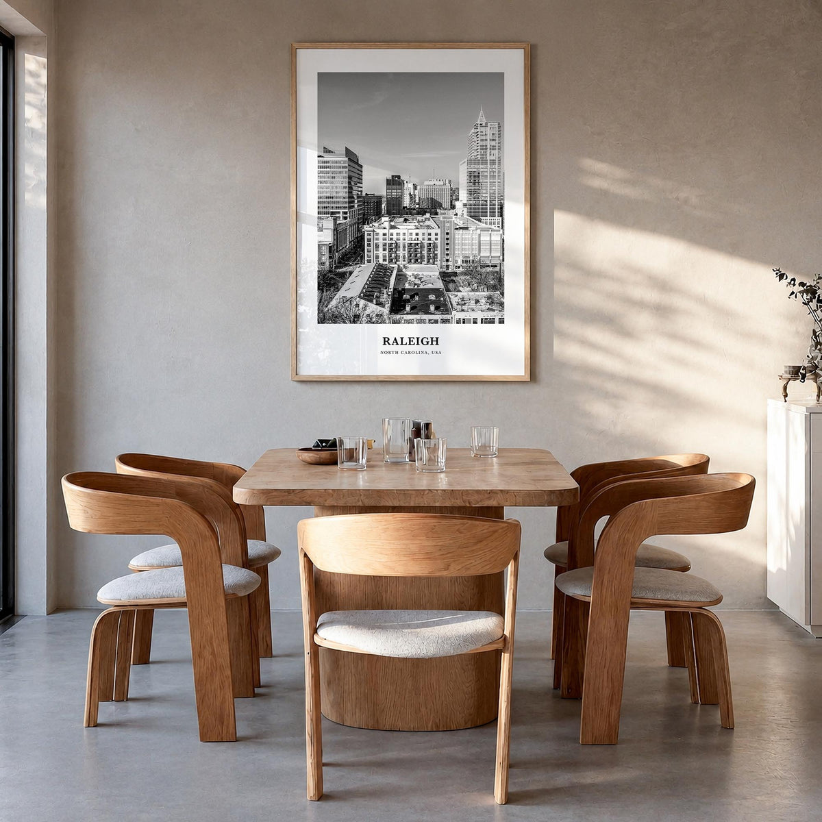 Raleigh no. 1 black & white classic poster of North Carolina, USA – vertical wall art in natural wood frame, hanging on wall