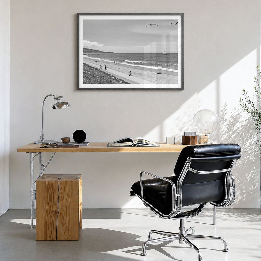 Redondo Beach Photo Poster in a black wood frame, hanging in a bright home office, white border