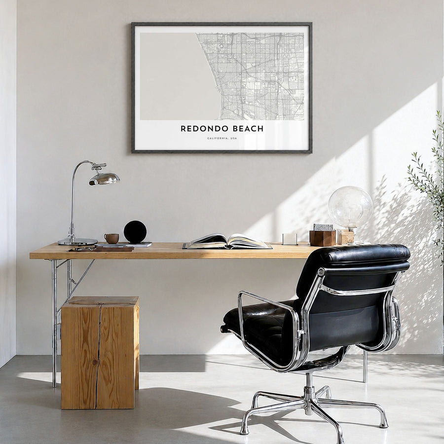 Redondo Beach Map Poster in a black wood frame, hanging in a bright home office