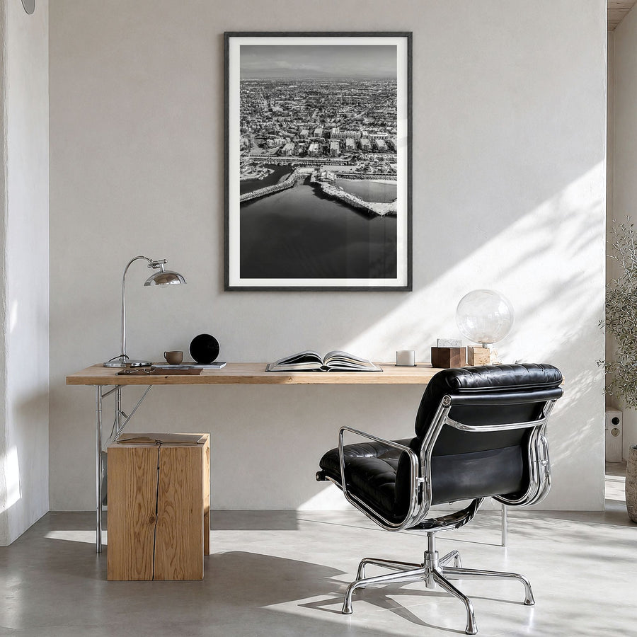 Redondo Beach Photo Poster in a black wood frame, hanging in a bright home office, white border