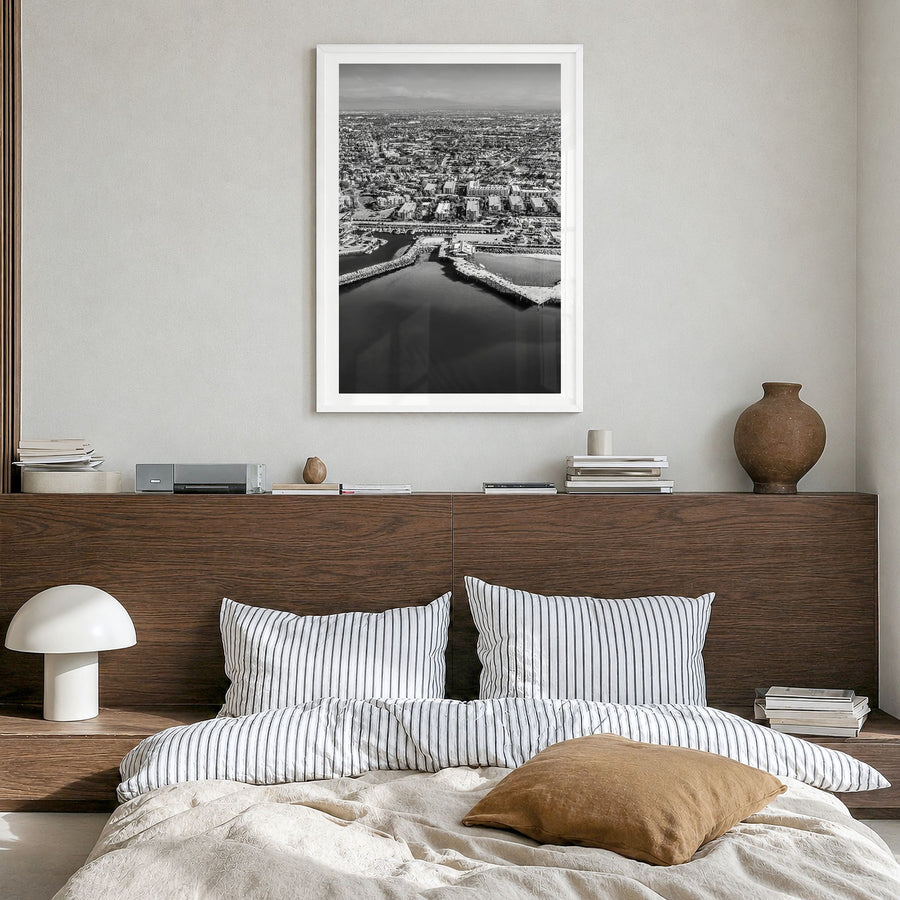 Redondo Beach Photo Poster in a white wood frame, hanging in a bedroom, white border