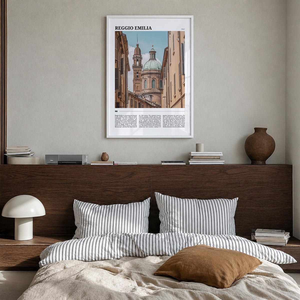 Reggio Emilia colorful travel poster of Italy – vertical wall art in white wood frame, hanging on wall